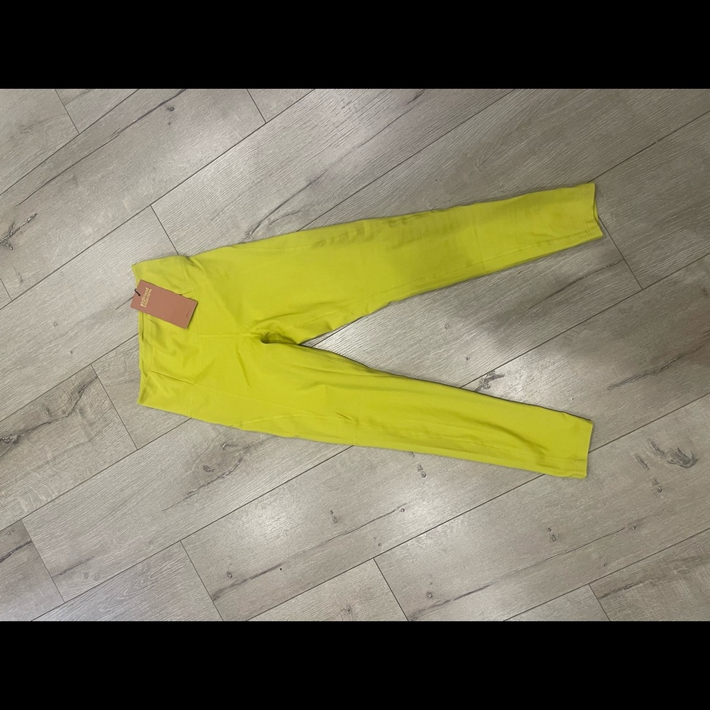 Neon yellow green girlfriend collective leggings. Size XS NWT